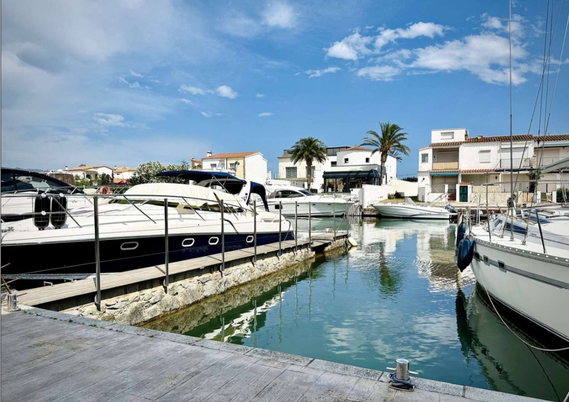 Fisherman-style house with sailboat mooring for sale in Empuriabrava